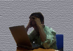 Stressed man with a laptop
